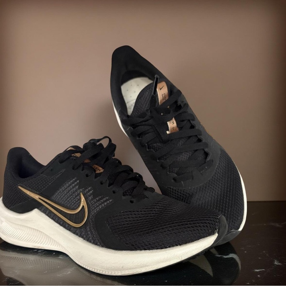 Nike Black and Gold Sneakers with Breathable Mesh